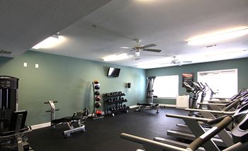 Fitness studio with free weights and equipment at the Haven at Reed Creek Martinez, Georgia